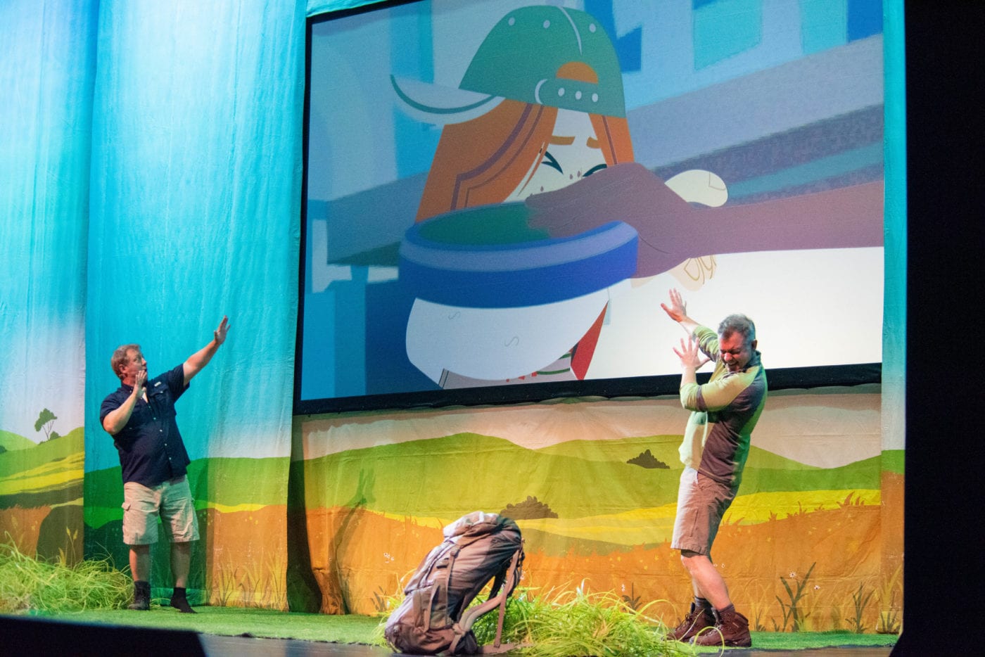 chris and martin kratt looking away from screen during wild kratts live